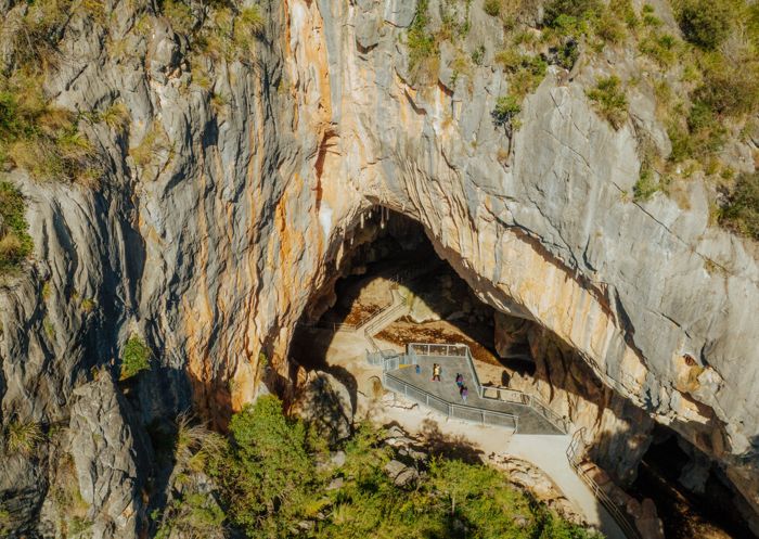Family walking in the Victoria Arch accessible platform at Wombeyan Karst Conservation Reserve, Wombeyan Caves