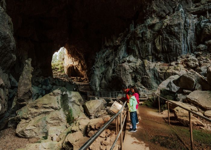   Family walking  in the Victoria Arch accessible platform at Wombeyan Karst Conservation Reserve, Wombeyan Caves